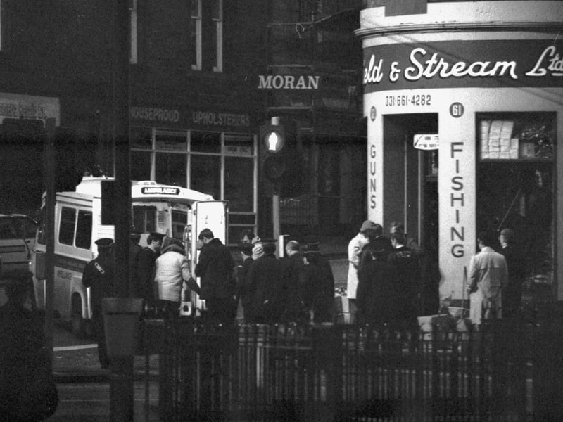 A man shut himself in the Field and Stream gun shop in Montrose Terrace Edinburgh, November 1985. By late evening the man had given himself up and was taken away in an ambulance.