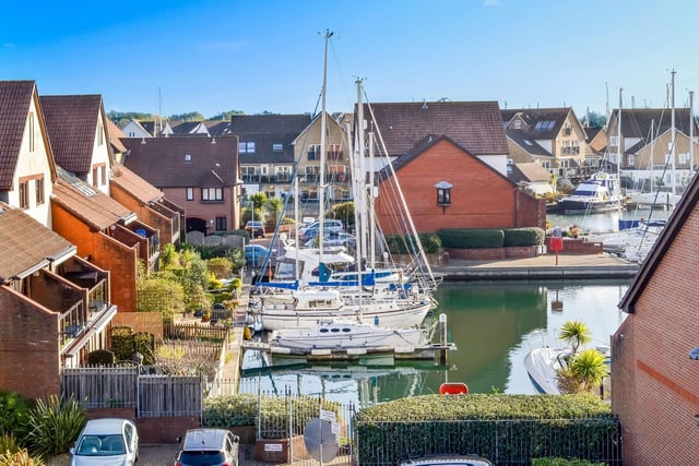 This four bedroom townhouse is on sale for £515,000 in Port Solent. It is listed by Fine and Country.