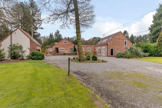 This four bedroom house has a two storey annexe and an indoor pool.