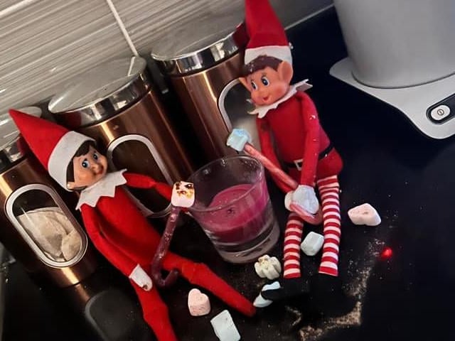 Kerry Frost shared this photo of the elves toasting marshmallows.
