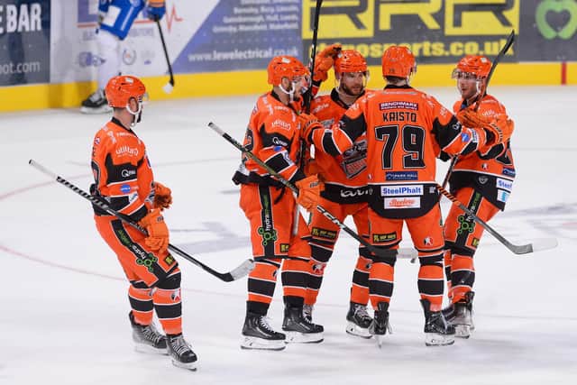 Danny Kristo congratulated after his first goal for Sheffield Steelers
