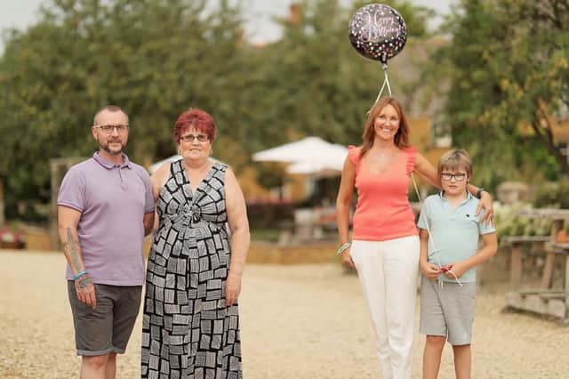 Pictured: Amanda Village (3rd right) with her son Kai (4th right), found birth mother Sue (2nd right) and her found brother Trevor (1st -on far left) Picture: WallToWall