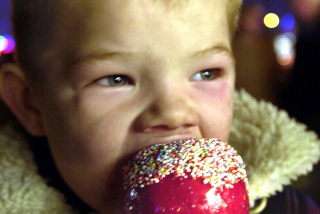 Sx-year-old Ross Stuart from Parson Cross enjoying his toffee apple and the fireworks in 2003