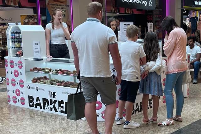 Shoppers having a look at The Barkery in Meadowhall