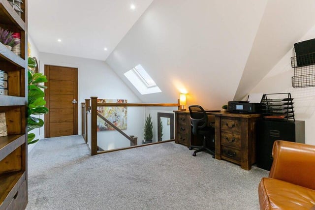 Spacious upstairs landing offers an ideal home office space, now that more and more of us are multi-tasking from the house.