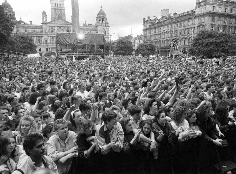A crowd of 50,000 music fans gathered in George Square for the Glasgow's Big Day concert in June 1990.
