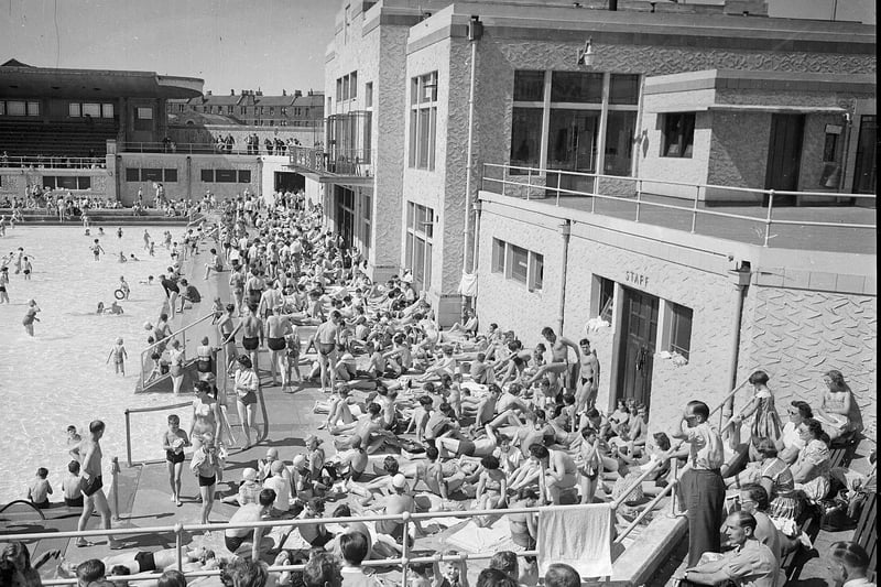 Crowds of people at the outdoor pool, where Sean Connery once worked as a lifeguard, in 1955.