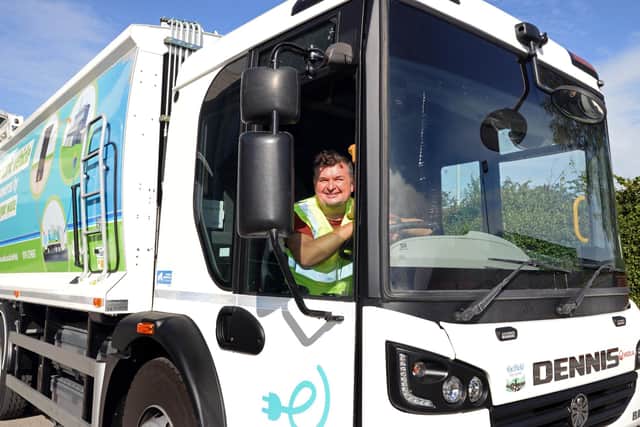 Coun Mark Jones, cabinet member for environment, street scene and climate change, pictured last year in a new electric bin lorry