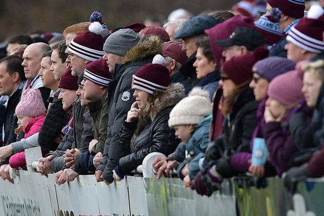 Supporters watch on at Mariners Park.