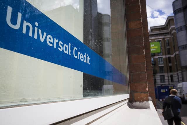 LONDON, ENGLAND - MAY 03: A Universal Credit sign in the window of the Job Centre in Westminster on May 3, 2016 in London, England. The Resolution Foundation, chaired by former Conservative Minister David Willets, has said the Government's benefit reform has "veered off track" due to cost-cutting.  They say that 2.5 million families could be worse off, some by over ï¿½ï¿½3,000 a year. Universal Credit is a single payment and replaces six current benefits, including Jobseeker's Allowance and Employment and Support Allowance. (Photo by Jack Taylor/Getty Images)