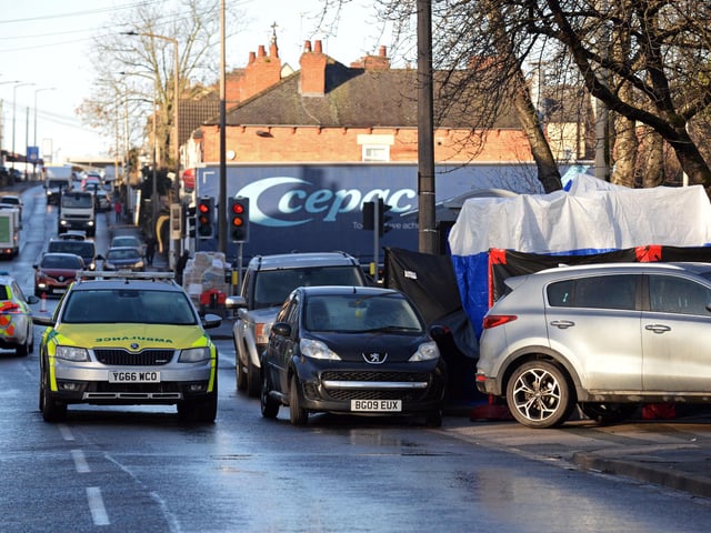 A tent has been erected at the spot where Lewis was shot dead in an attempt to preserve any forensic evidence at the scene to help detectives investigating the murder.