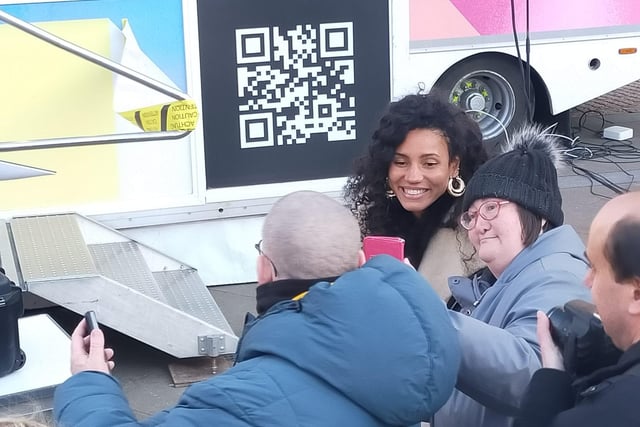 BBC Radio 1's Vick Hope takes photos with fans on the Peace Gardens.