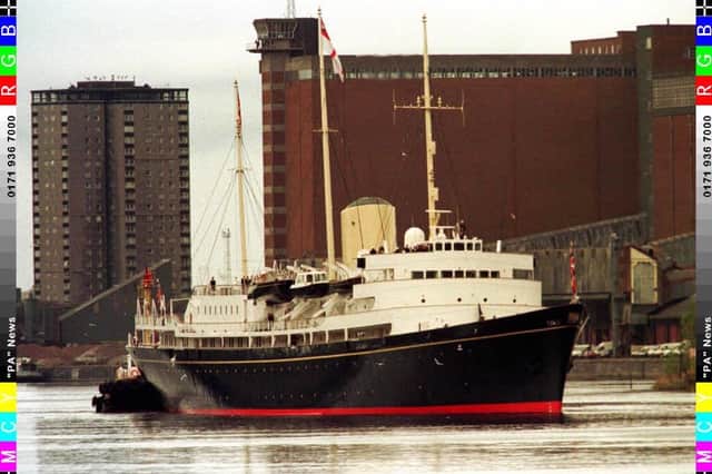 The Royal Yacht Britannia makes her way up the River Clyde, Glasgow where she was built, during her farewell voyage  around the British Isles.