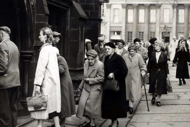 People heading into Sheffield Cathedral in June 1960.