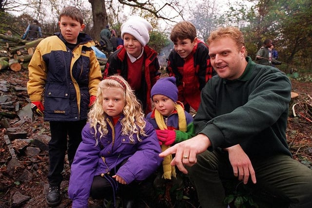 Park Ranger Peter Slater with kids from Mundella Primary School pictured in Lees Hall Wood, Sheffield. Pictured, left to right: Jack Huckstepp, Sam Drabble, Samantha Godbehere, Lewis Oldfield and Emily Eils, November 1997