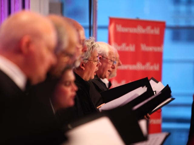Choirs singing with the Albion choral group at the Millennium Gallery in Sheffield in March to launch the Tour de France Grand Depart arts festival