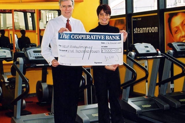 Steve Brailey, Chief Executive of SIV presents Alison Ward, Charity Director of the Help a Hallam Child Appeal, with a cheque of £5,000 donated by SIV in 2003