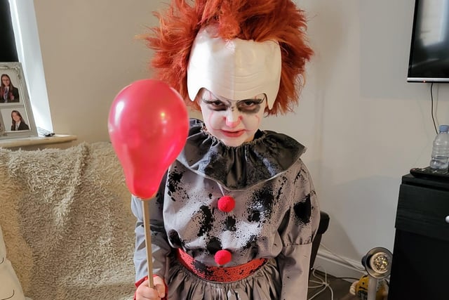 An amazing Pennywise costume shared by Melissa Hill - they even have the iconic balloon.