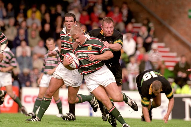 Northampton's Mattie Stewart's face is a picture of determination as he hauls back Adam Balding of Leicester during a Premiership match. Scotland prop Stewart was in the Saints front row in the 2000 Heinken Cup final win over Munster. He was capped 34 times.