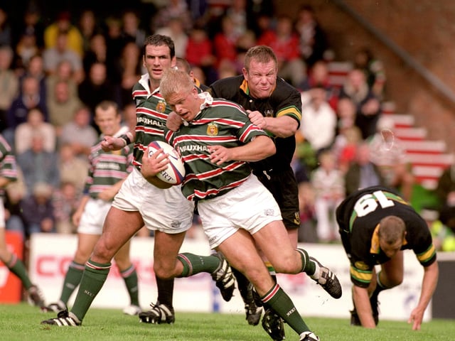 Northampton's Mattie Stewart's face is a picture of determination as he hauls back Adam Balding of Leicester during a Premiership match. Scotland prop Stewart was in the Saints front row in the 2000 Heinken Cup final win over Munster. He was capped 34 times.
