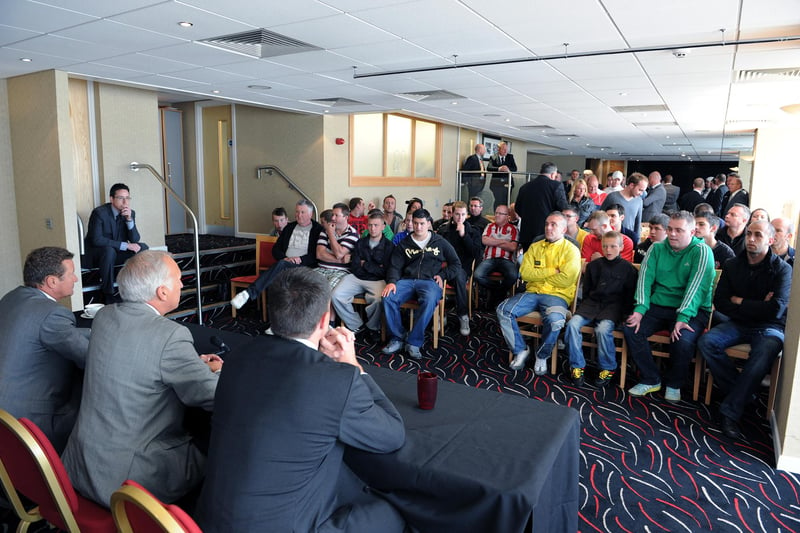 Then-United chairman Kevin McCabe talks to angry Blades supporters after the appointment of Danny Wilson