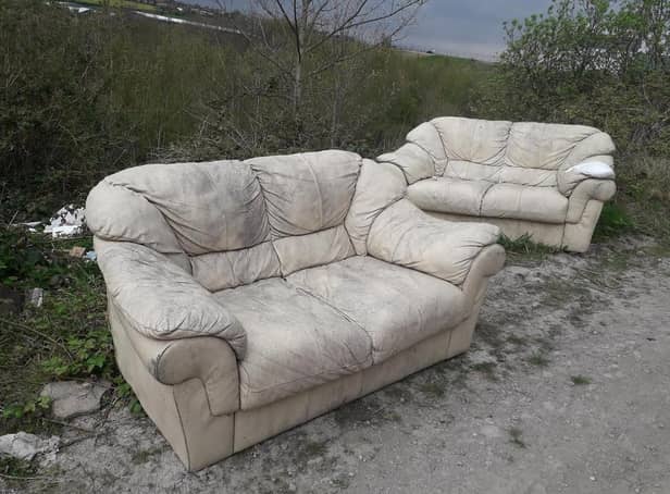 Van loads of rubbish have been left at the site, including this sofa.