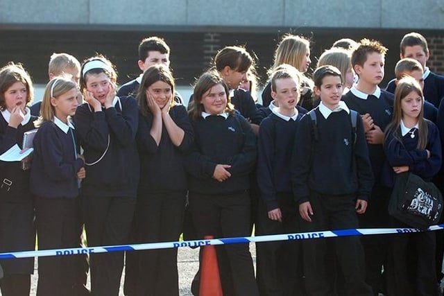 Pupils watching  a mock crash scenario staged at Myers Grove school as a road safety lesson for pupils... September 2006