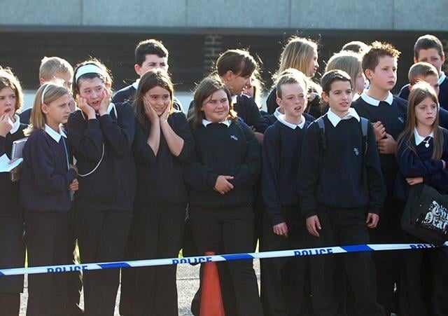 Pupils watching a mock crash scenario staged at Myers Grove school as a road safety lesson for pupils... September 2006