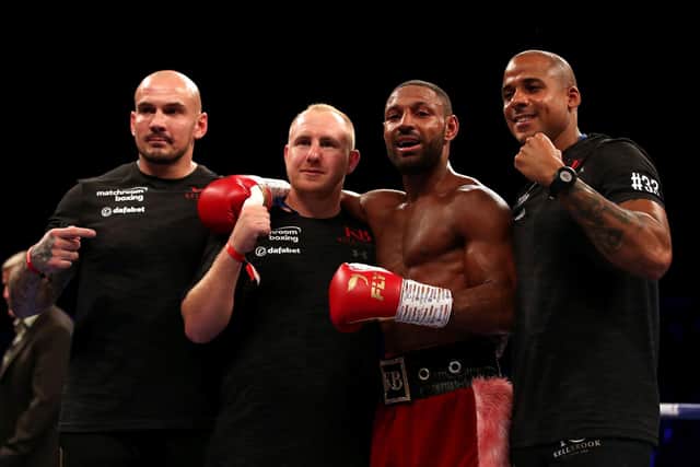Kell Brook (second right) pictured with trainer John Fewkes (second left) and his ring-side team after winning the Final Eliminator WBA Super-Welterweight Championship at Sheffield Arena in 2018.