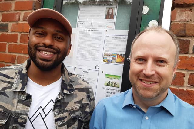 Former mayor of Sheffield Magid Magid and Craig Wolstenholme in front of a tribute to Noami Colcomb at Naomi's Place, Kelham Island