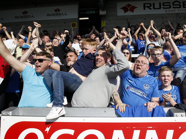 Pompey fans celebrate their side's dramatic winner.