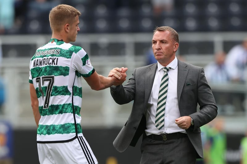 Celtic manager Brendan Rodgers and Maik Nawrocki, who has picked up an injury following the 1-0 defeat at Kilmarnock