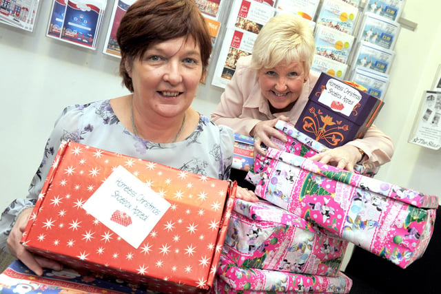 Debbie Ogden and Christine Ball from Star reception with their Homeless Christmas Shoe Boxes in 2014