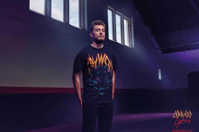 Scott Savage, son of Def Leppard bassist Rick Savage, models the new Project Presents clothing range.