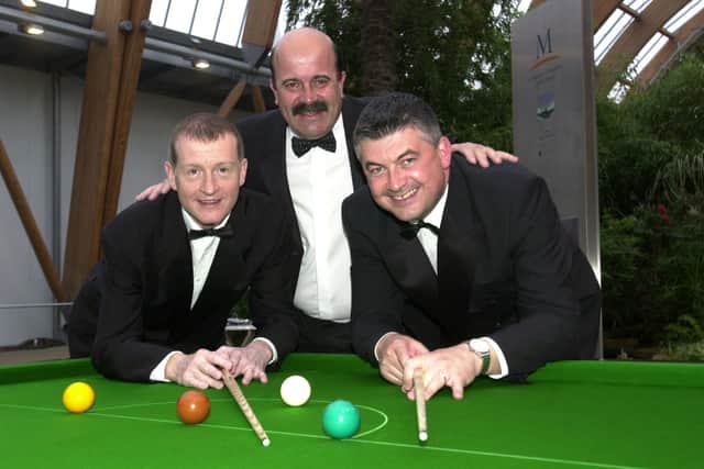 SHEFFIELD CUE BALL  l/r: Steve Davis Willie Thorne and John Parrott  the snooker table in the Winter Garden at the Sheffield Cue Ball, Millenium Galleries.          16 April 2004