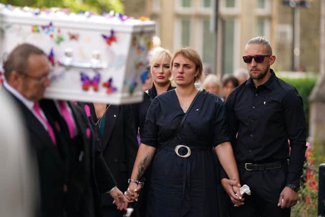 The coffin of nine-year-old stabbing victim Lilia Valutyte being carried into St Botolph's Church in Boston, Lincolnshire followed by her mother Lina Savicke and step-father Aurelijus Savickas:  Photo credit: Joe Giddens/PA Wire