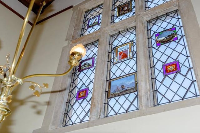 While most of the windows are now  double glazing, so the property can offer comfortable modern living, some of the stained glass windows remain.