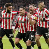 Sheffield United's Jack Robinson (second from right) celebrates after scoring against Swansea: Danny Lawson/PA Wire.