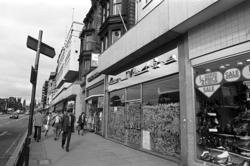 Shops in Princes Street Edinburgh were closing down regularly in 1981, due to a combination of high rates and poor trade. One of the casualties, Jean Machine, with its soaped-up windows.