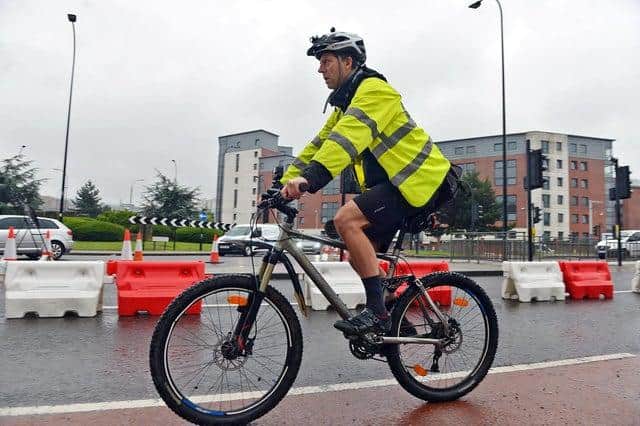 Star business editor David Walsh cycling in Sheffield city centre