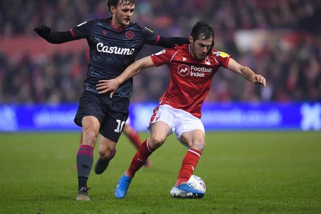 Yuri Ribeiro of Nottingham Forest is challenged by John Swift of Reading: Laurence Griffiths/Getty Images