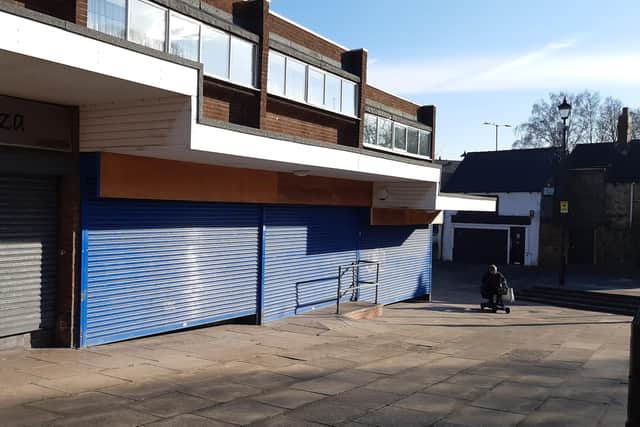 Residents say the Nisa store on Market Square, Woodhouse, has been closed for a week, and is the latest big store to close on the same parade of shops. Pictured is the former Fulton Foods shop,  nearby, which closed last year
