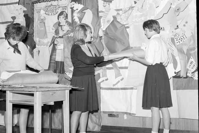 Firrhill Secondary School pupils put up Christmas decorations in 1962.