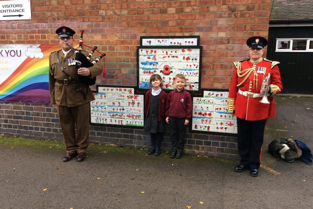 Local musician Pete Ward visted Tibshelf Infant and Nursery School to mark Armistice Day with pupils. Children and staff observed a two minute silence in front of Remembrance tiles created to mark the day.
Pete also played The Last Post at St John's Church and youngsters have made poppy stones which have been laid at the church’s memorial.