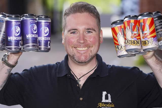 Dan Baxter Sales Director at Abbeydale Brewery with two of their most popular beers. Picture Scott Merrylees