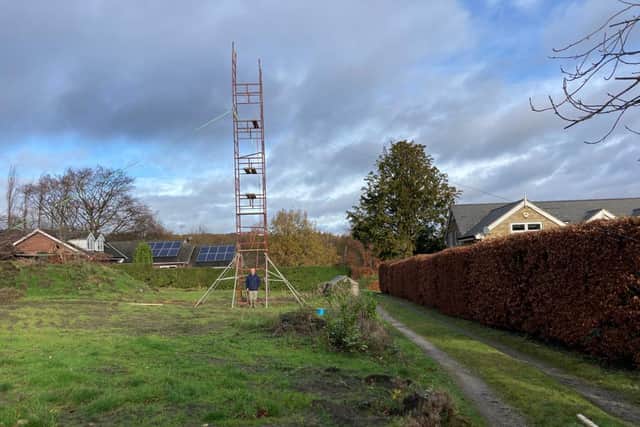 The scaffolding tower erected by residents in Dore who are fighting plans for new apartment blocks