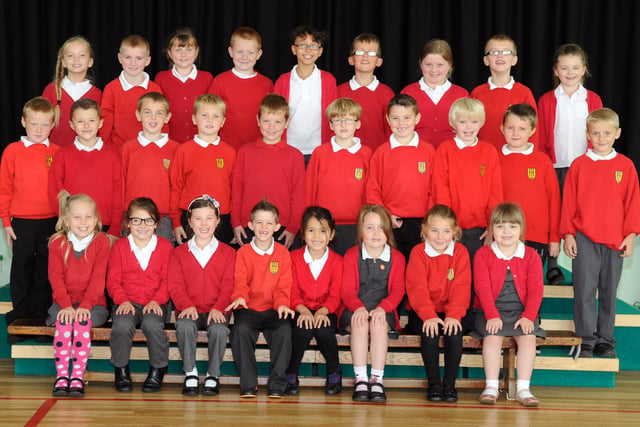 Biddick Hall Junior School in 2014 and it is Miss Archer's Year 3 class who are all smiles for the camera.
