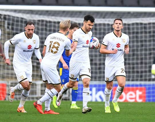 The average age of MK Dons' squad - compared to League One. (Photo by Tony Marshall/Getty Images)