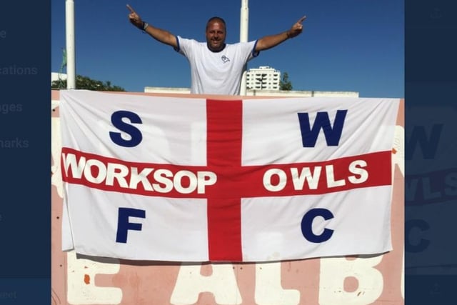 David Forman with his Worksop Owls flag he took on Wednesday's pre-season tour of Portugal in 2019.