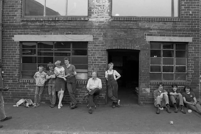 Cutlery workers take a break, Sydney Street, Sheffield, 19 July 1983